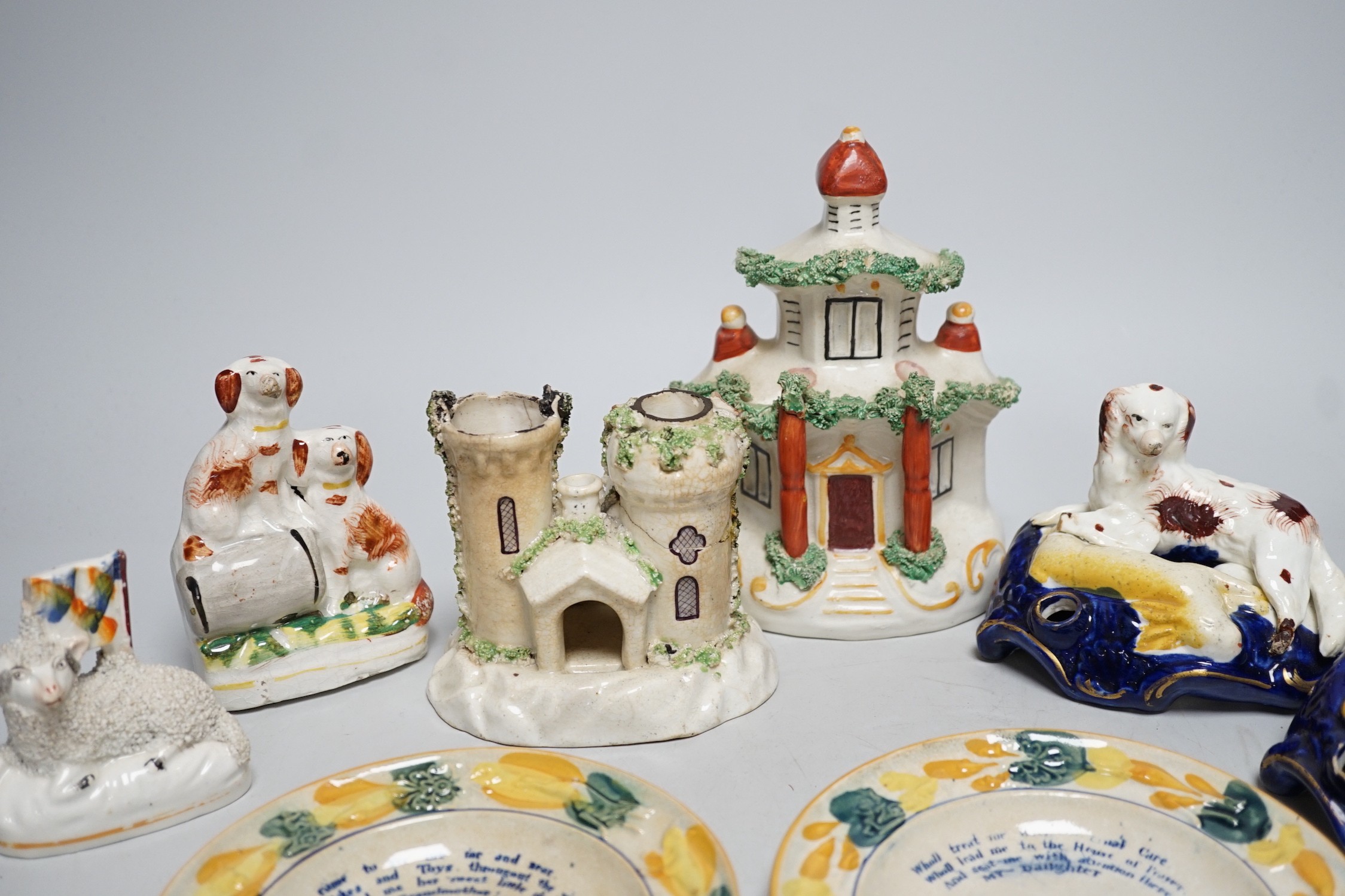 A pair of 19th century Staffordshire King Charles Spaniel pen holders and two pearl ware plates etc (8)